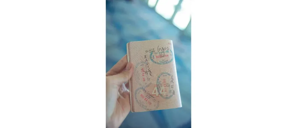 Passport with visa stamps representing a Canada study permit application
