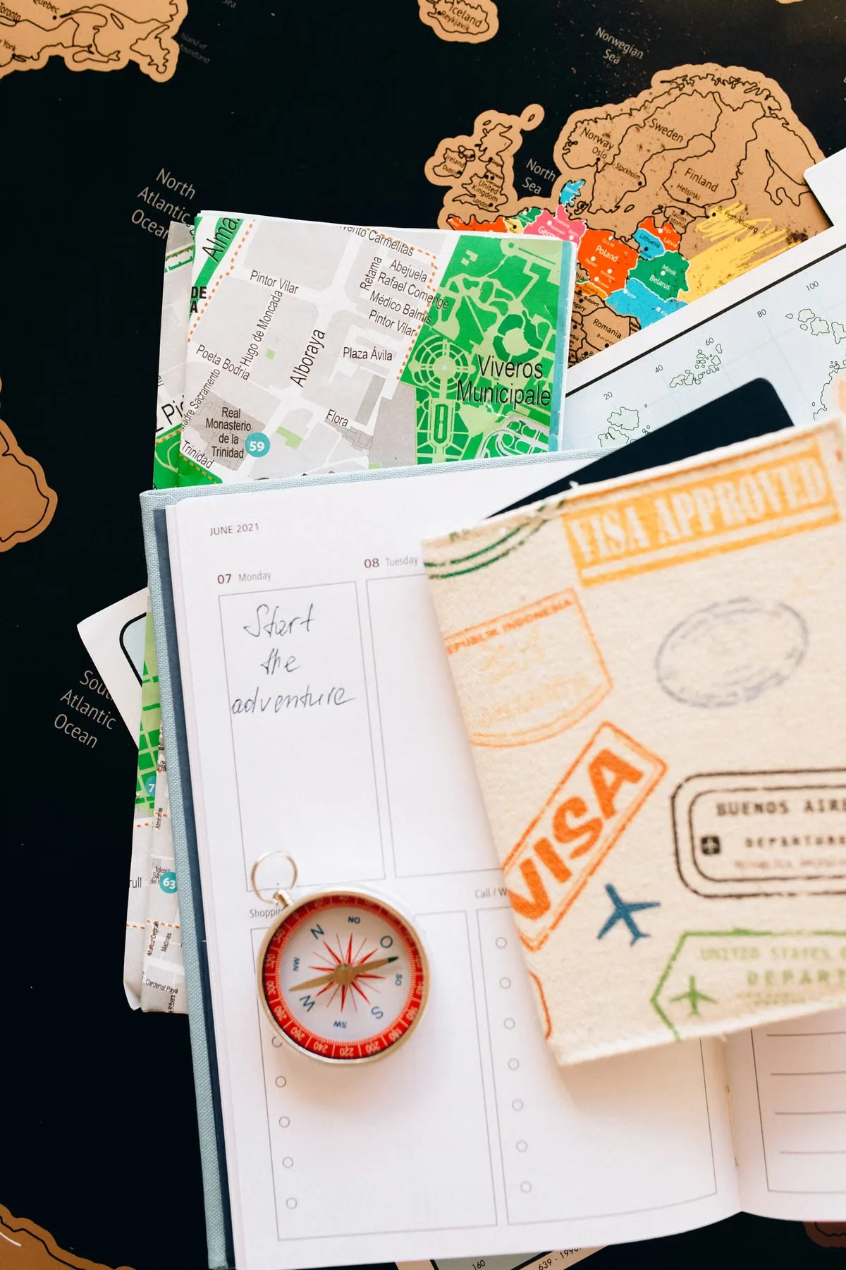 Travel planning notebook and accessories, representing steps to take during the VFS Global suspension