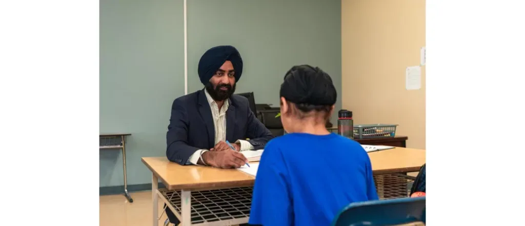 Learner Aid counsellor reviewing a student